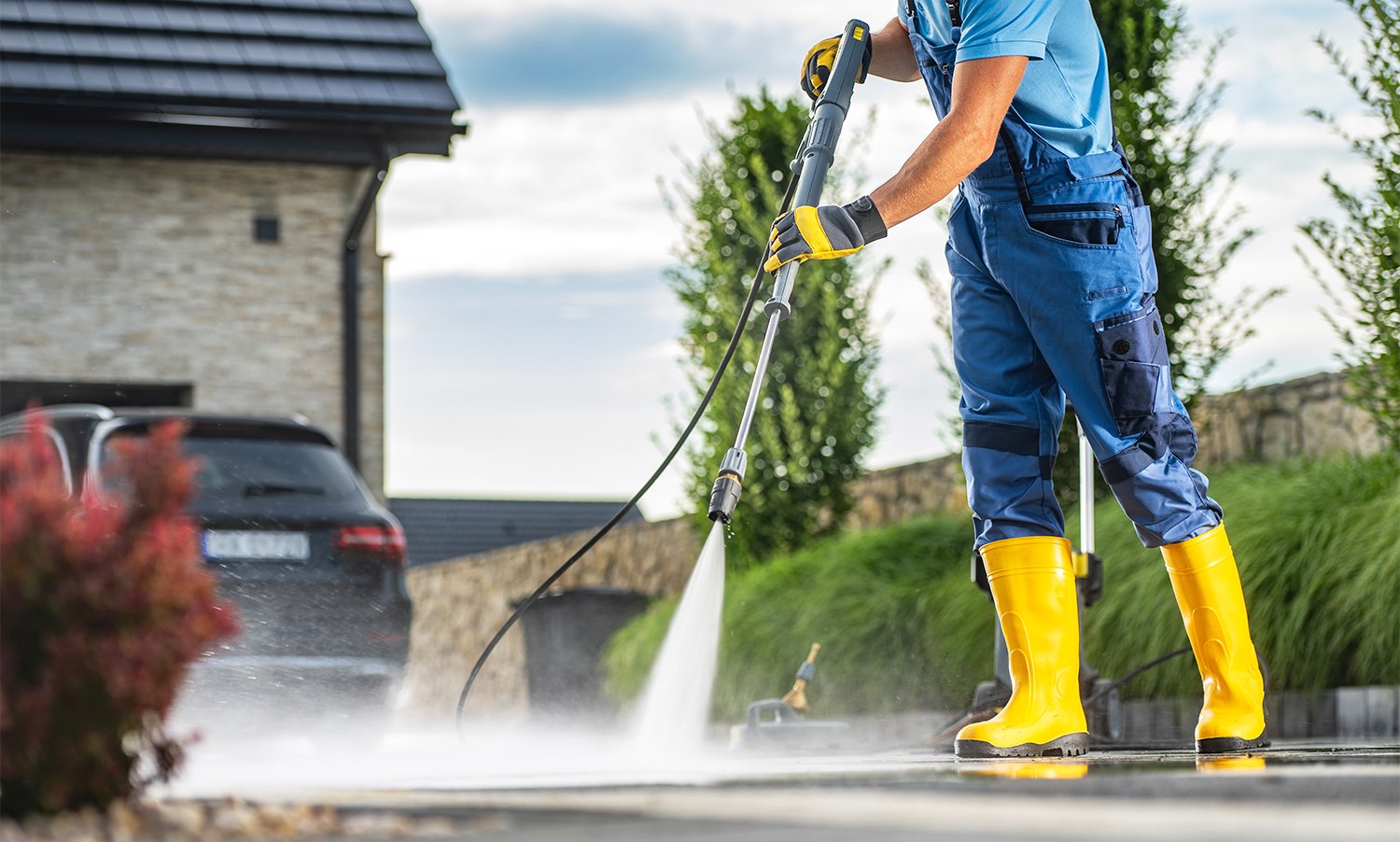 Powerful Pressure Washer Using to Clean Dirty Driveway - Tampa