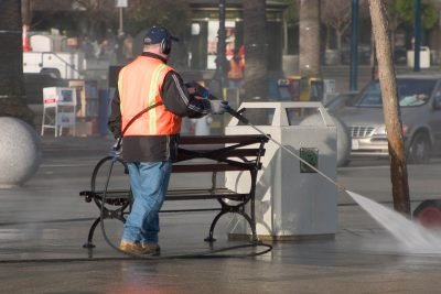 Powerful Pressure Washer Using to Clean Dirty Driveway